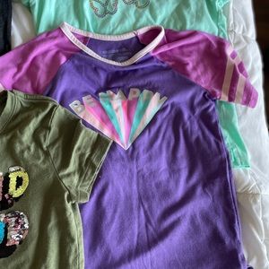 Girls size 8 shirts and 2 pairs of leggings